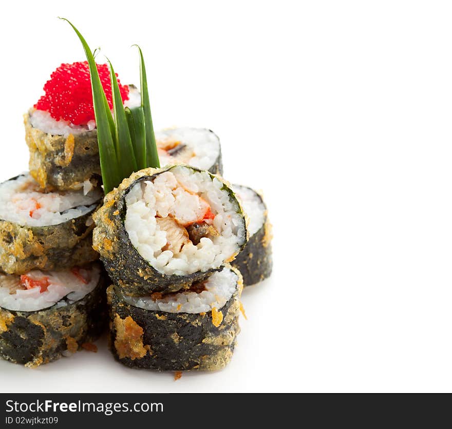 Tempura Maki Sushi - Deep Fried Roll made of Smoked Eel, Crab Meat and Cream Cheese inside. Served with Lettuce and Tobiko Caviar. Tempura Maki Sushi - Deep Fried Roll made of Smoked Eel, Crab Meat and Cream Cheese inside. Served with Lettuce and Tobiko Caviar