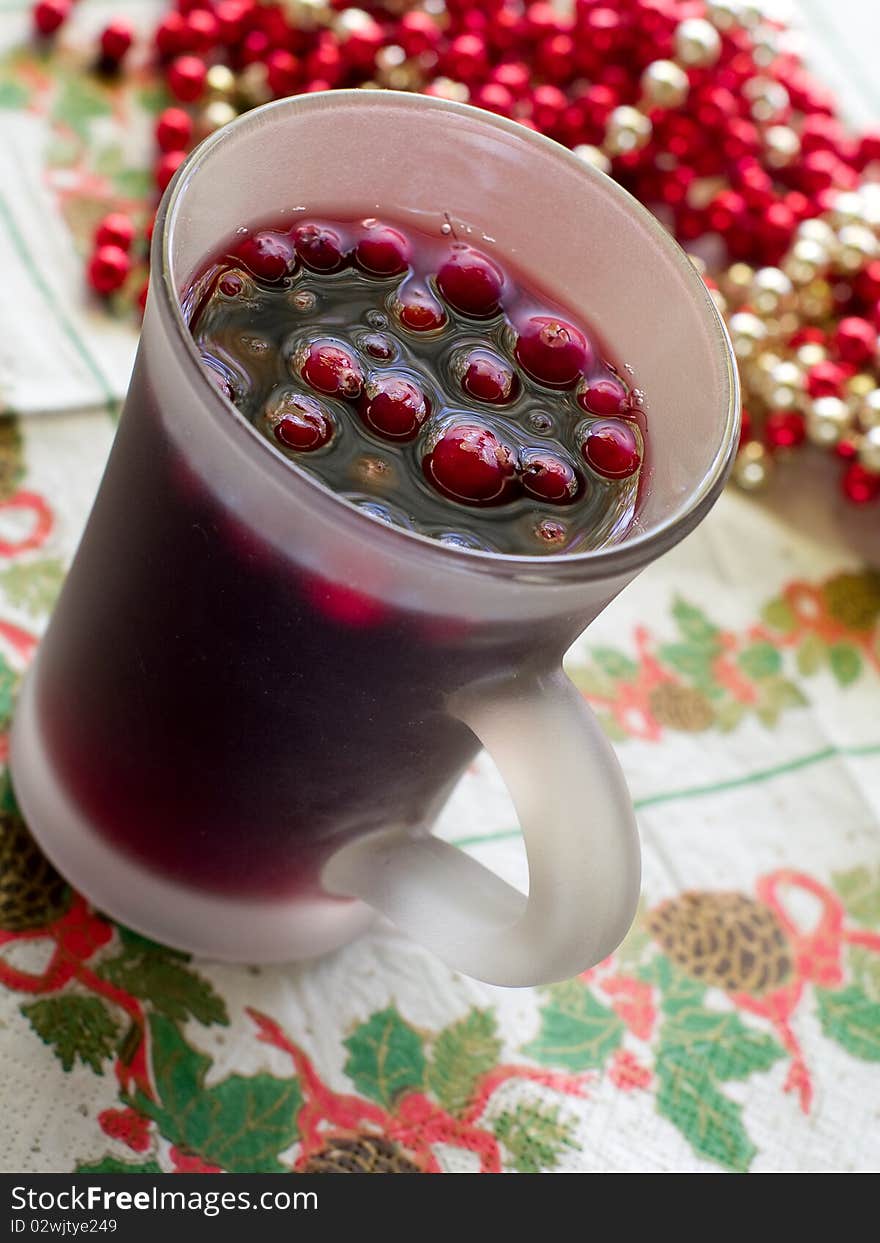 Hot drink with cranberries and cinnamon. Hot drink with cranberries and cinnamon