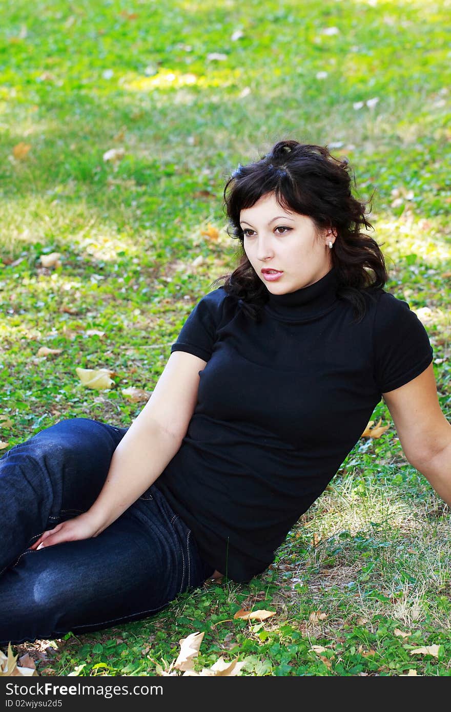 Young girl in the park to nature