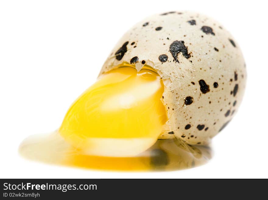 Broken egg on white background