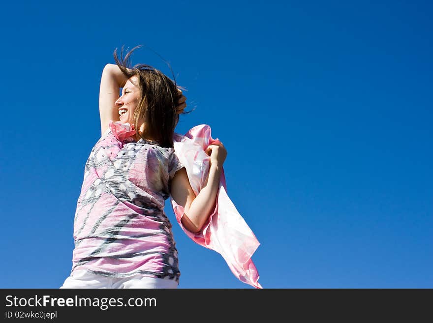 Positive young girl against the sky in summer. Positive young girl against the sky in summer