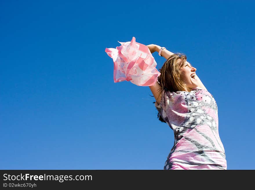 Positive Young Girl Against The Sky In Summer