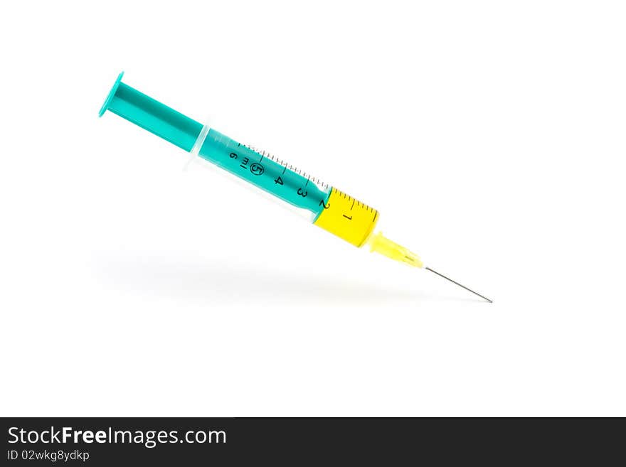 Isolated hypodermic syringe on white