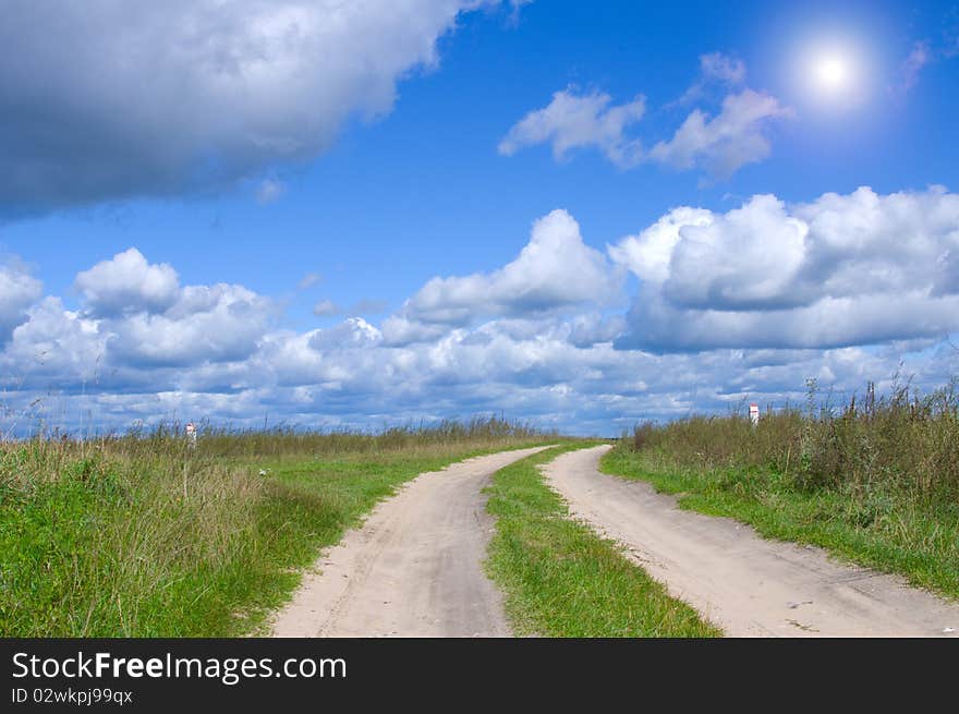 Road lane and deep blue sky.