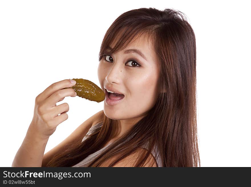 Woman eating a pickle