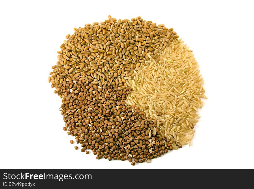 The grains of rice combined together, wheat and buckwheats. The grains of rice combined together, wheat and buckwheats