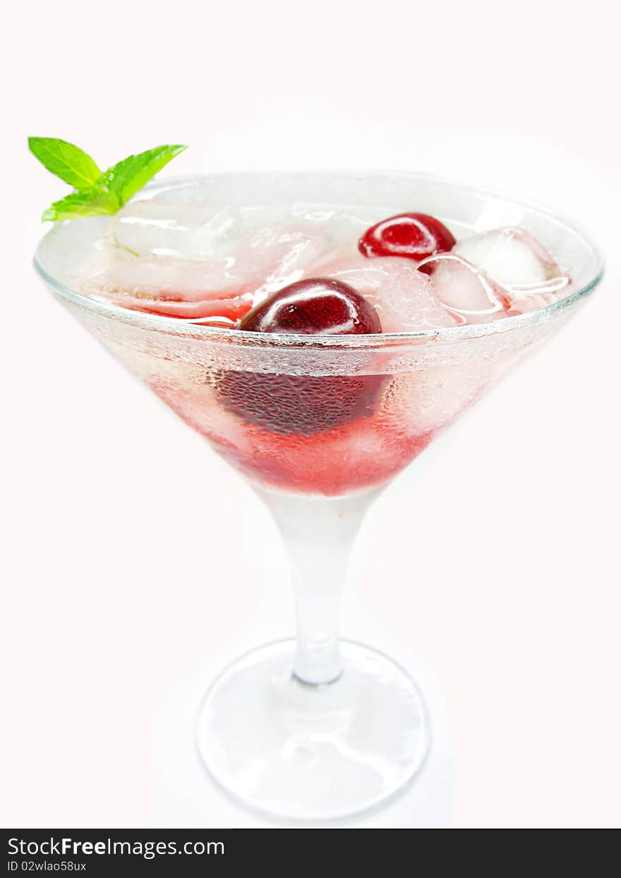 Alcohol liqueur cocktail with cherry