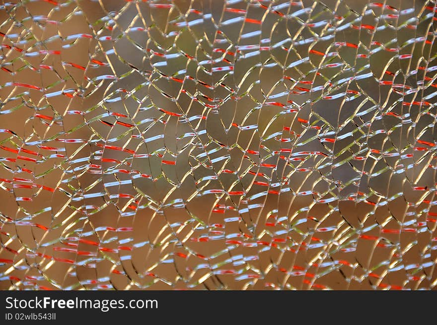 Colored Reflections of Cracks in Broken Glass. Colored Reflections of Cracks in Broken Glass