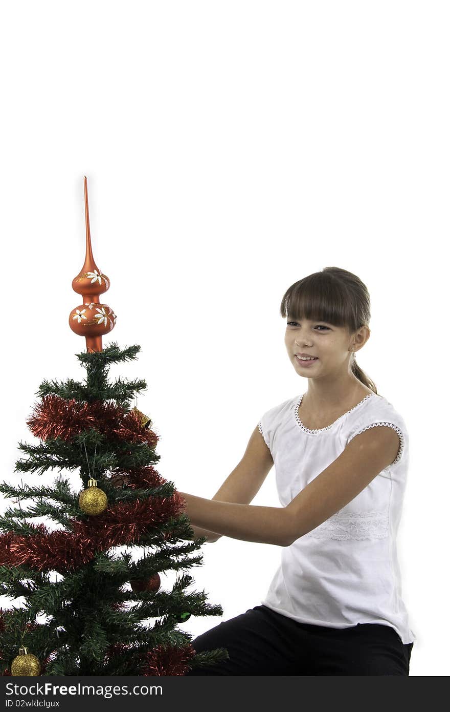 Girl decorate a New Year tree, isolated