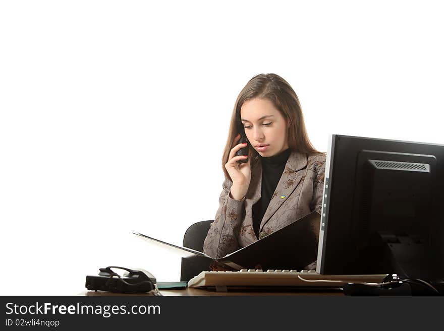 Businesswoman speak by phone and read a document. Businesswoman speak by phone and read a document