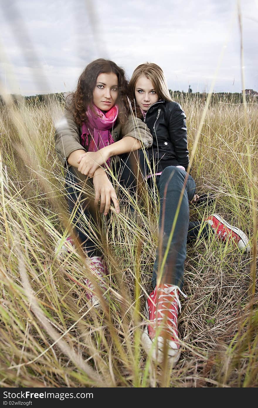 Autumn portrait of two young women