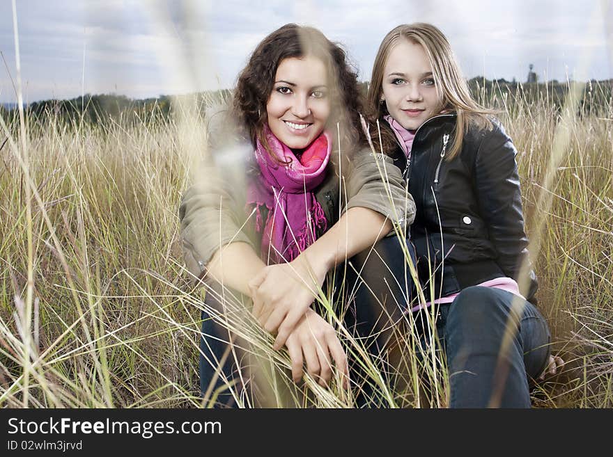 Autumn Portrait Of Two Young Women