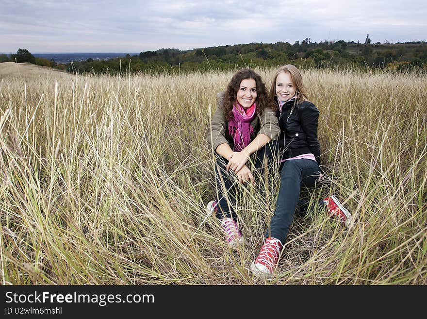 Autumn Portrait Of Two Young Women