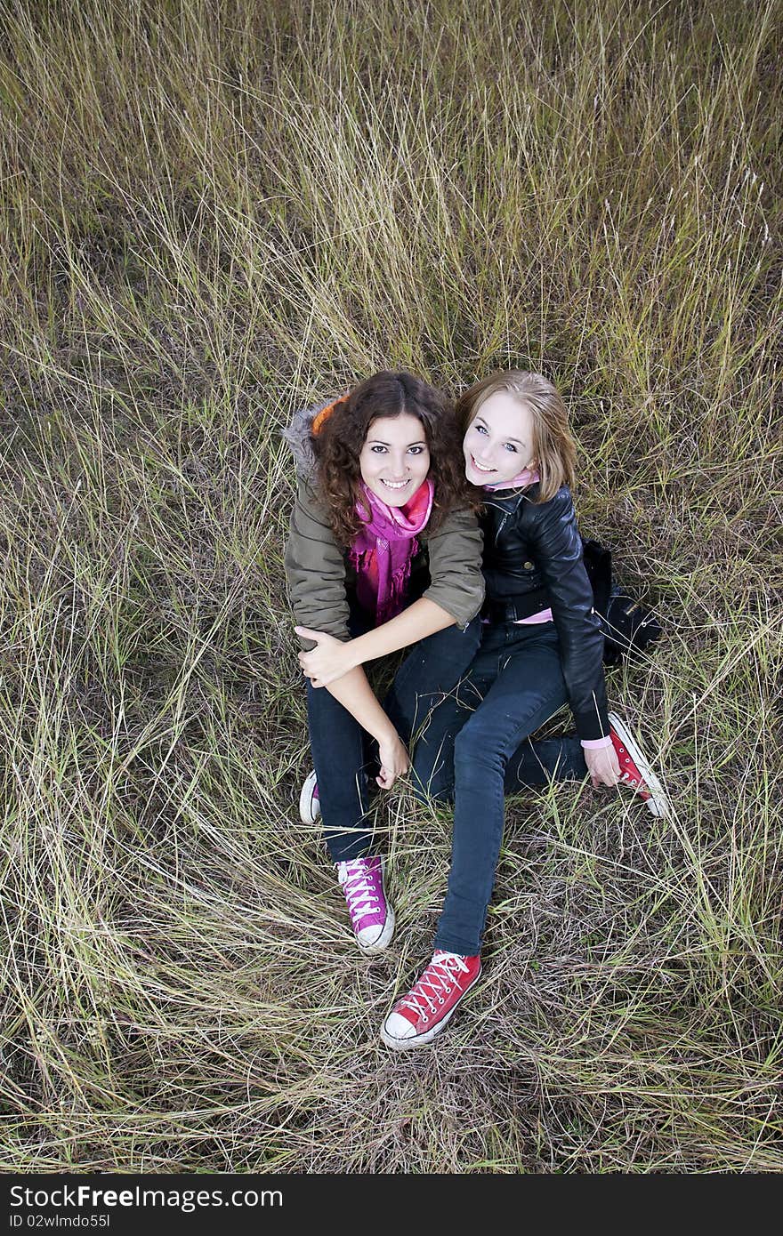 Autumn portrait of two young women