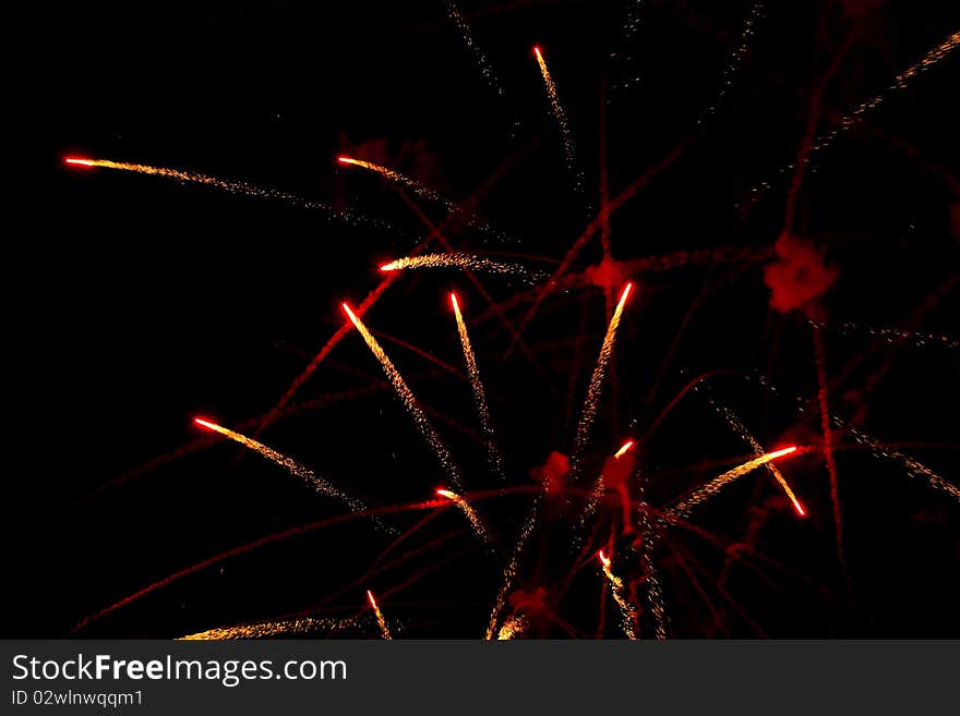 Firework streaks in the night sky. Firework