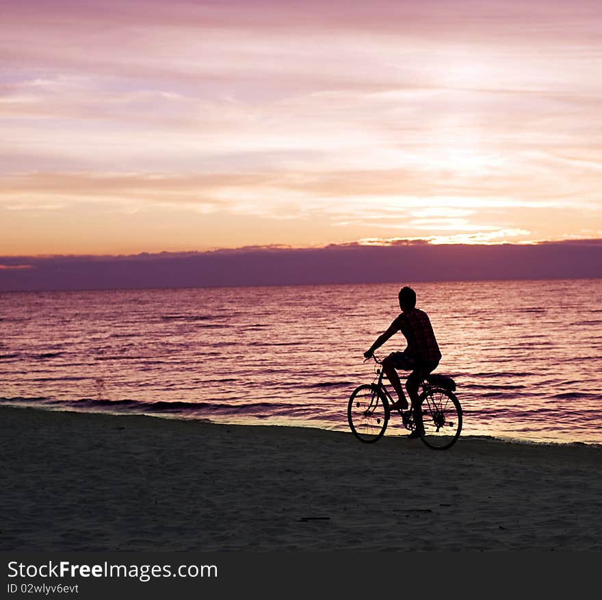 Bicyclist on the beach