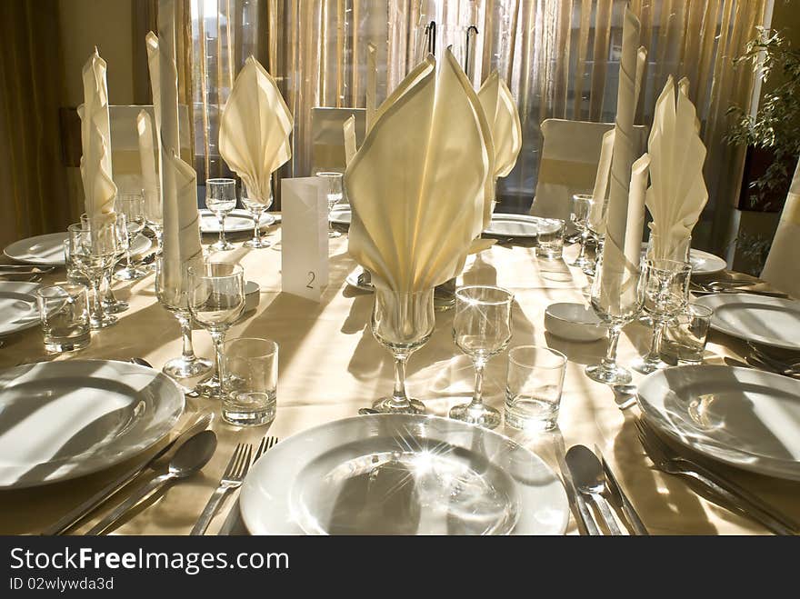 Festive table setting in front of window