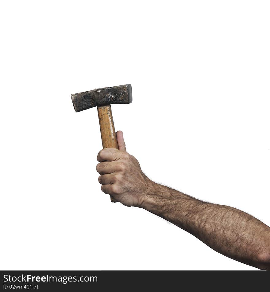 Hand holding a hammer