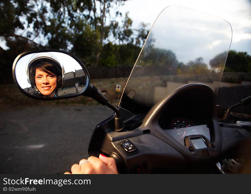 Young caucasian woman is driving a bike. Young caucasian woman is driving a bike