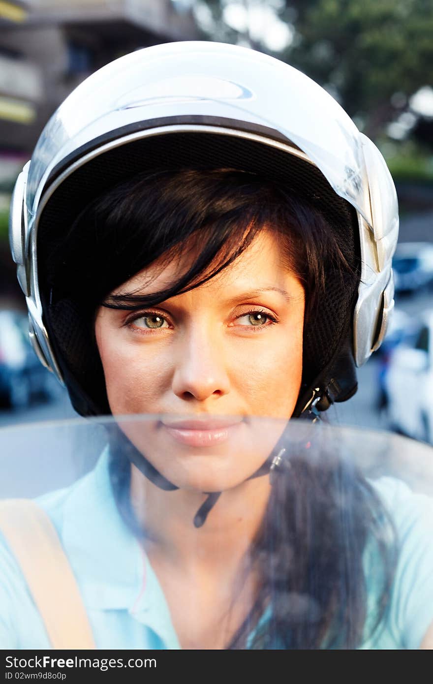 Young caucasian woman is driving a bike. Young caucasian woman is driving a bike