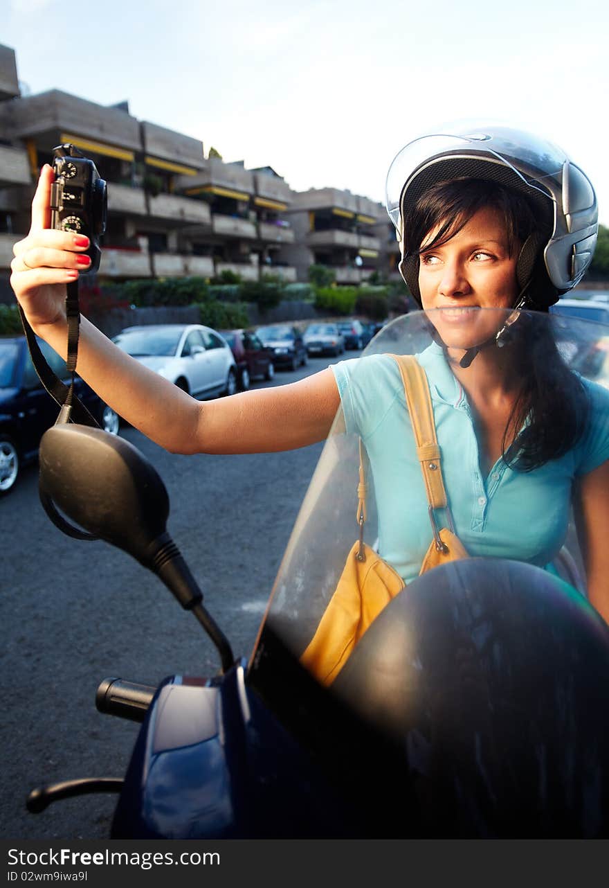 Young caucasian woman is driving a bike. Young caucasian woman is driving a bike