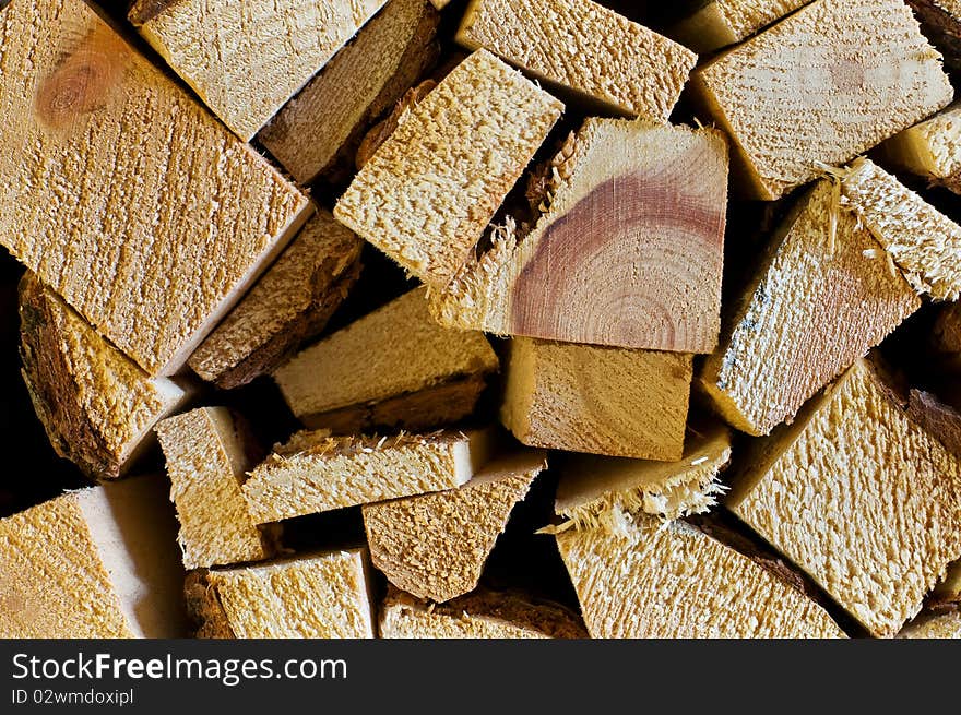 Stack of wood to heat in the cellar