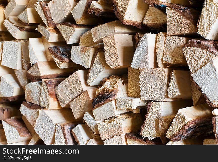 Stack of wood to heat in the cellar