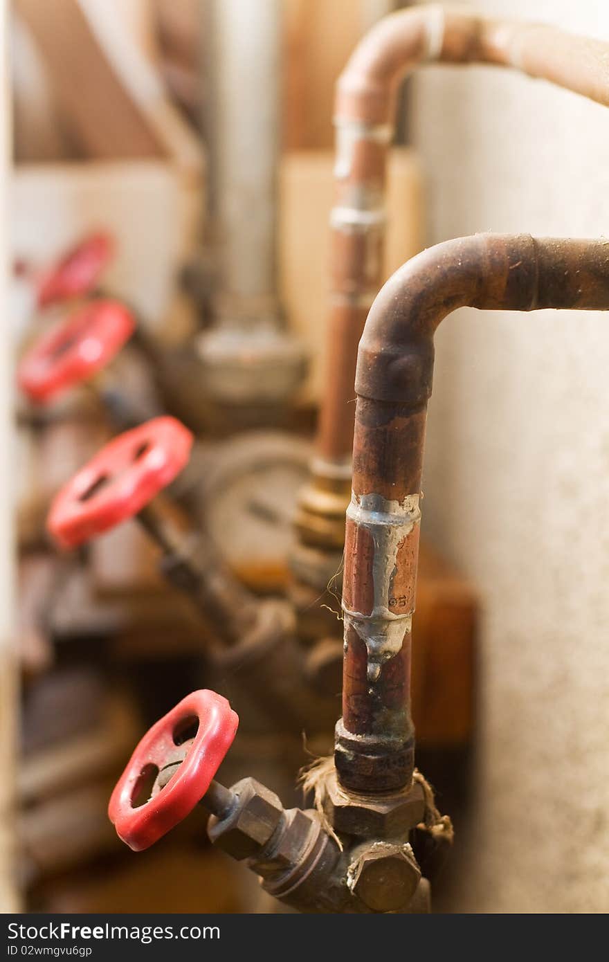 Valves in the cellar installed in a house for water