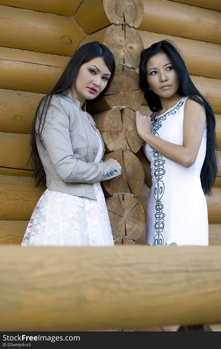 Two female friends walking outdoor