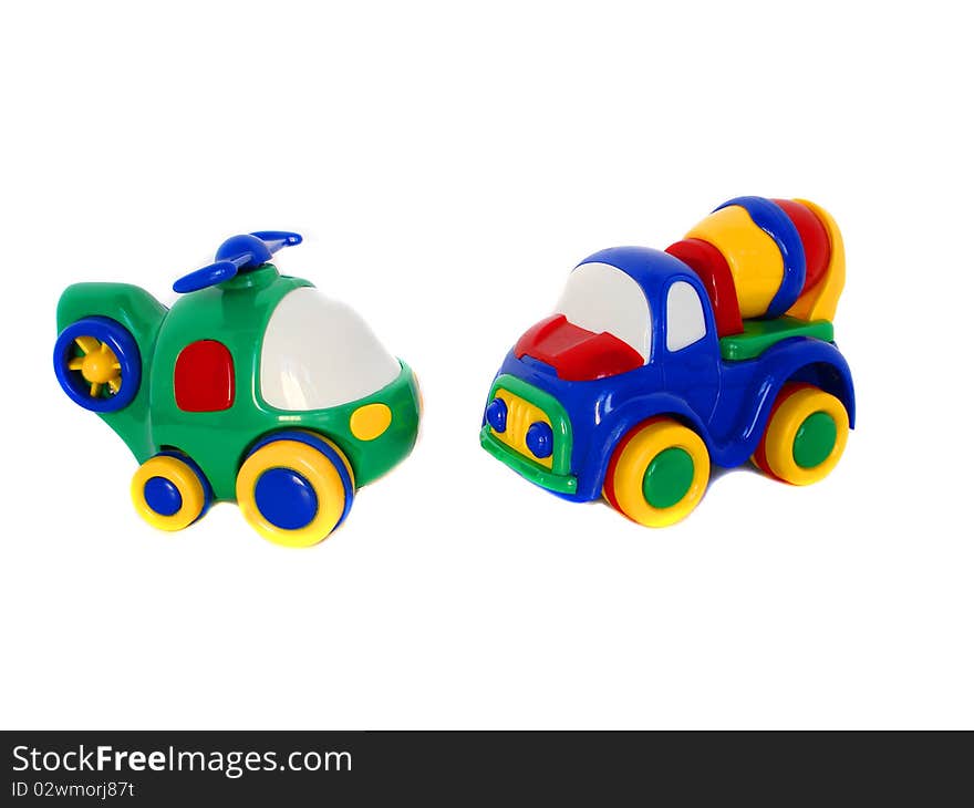 Multicoloured toy car and  helicopter on white. Multicoloured toy car and  helicopter on white