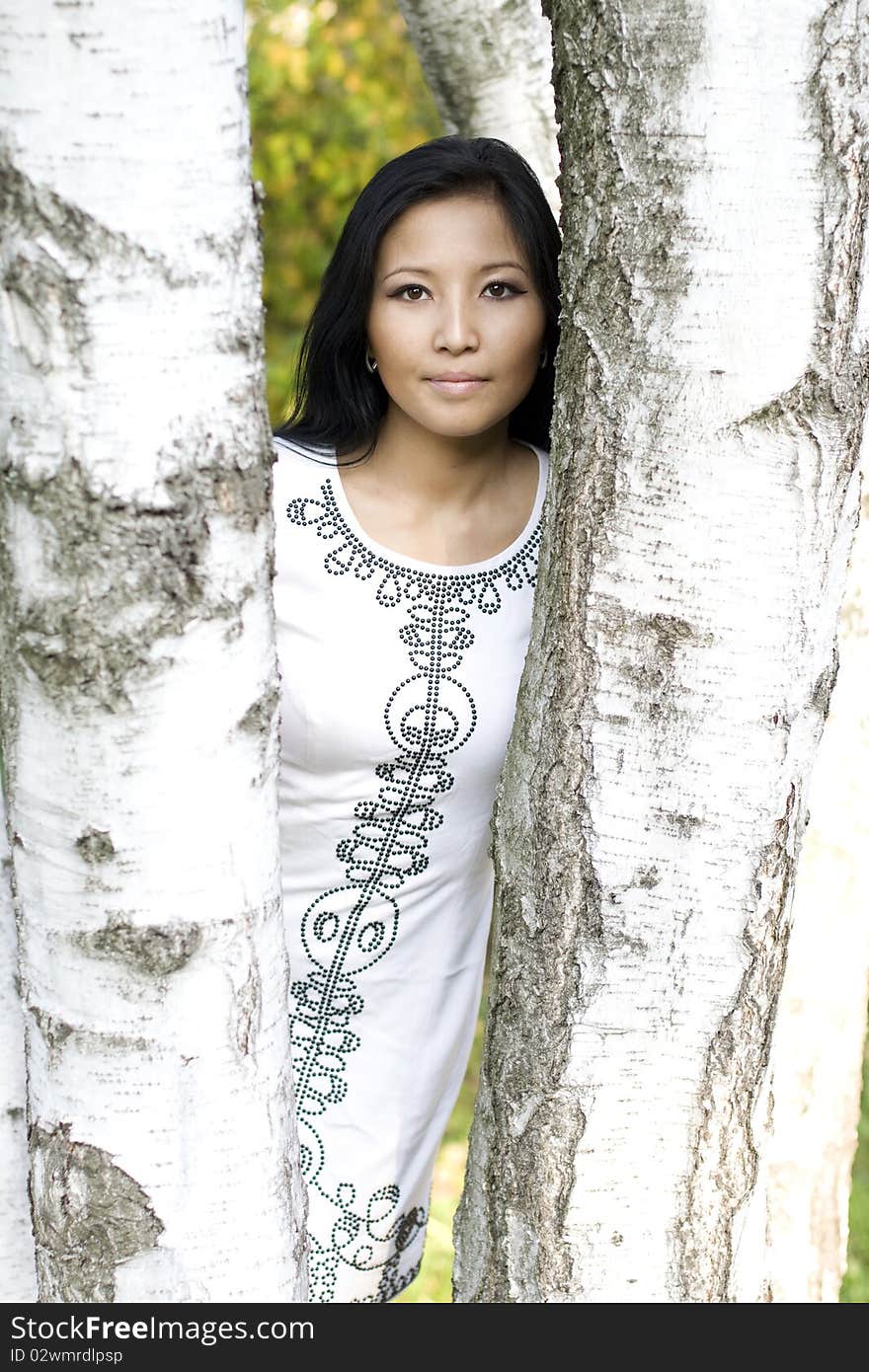 Girl In Autumn Park