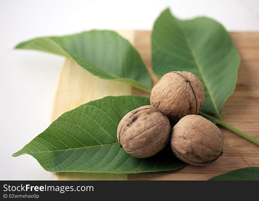 Walnuts, walnut nuts and leaves