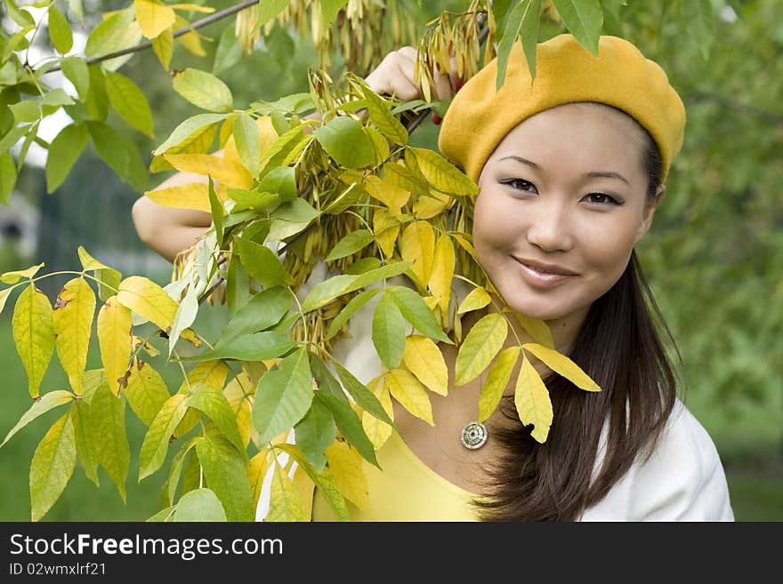 Girl walking in autumn park