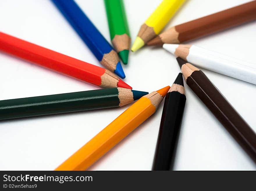 Many colour pencils close up