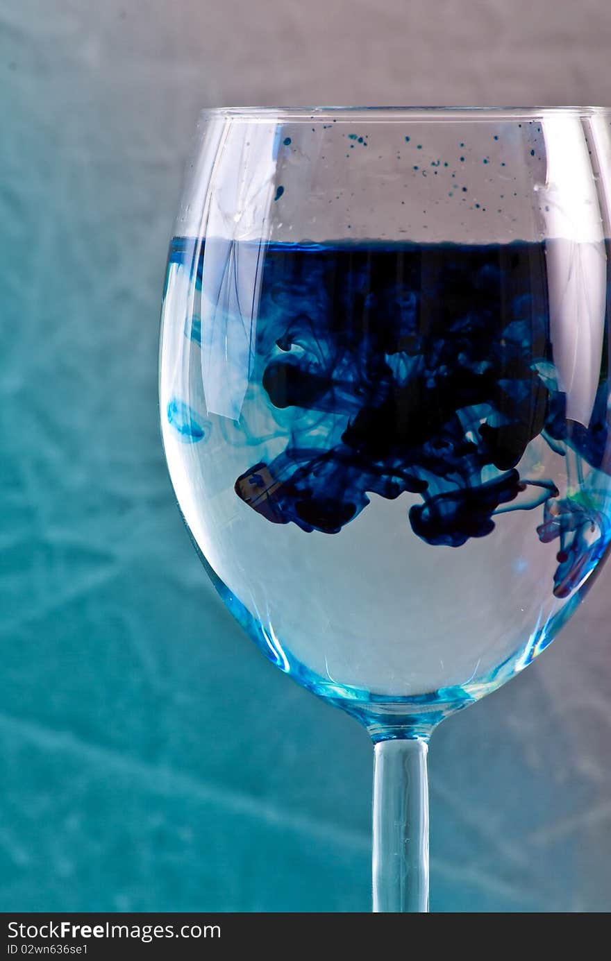 Blue Swirls in Wine Glass. Blue Swirls in Wine Glass