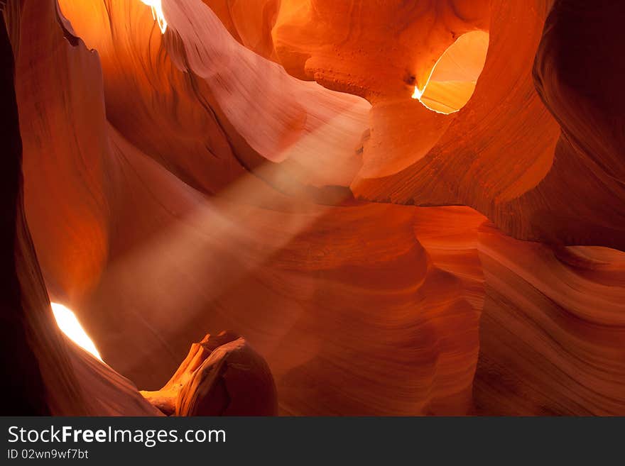 A photo of light beam taken in lower antilope canyon. A photo of light beam taken in lower antilope canyon