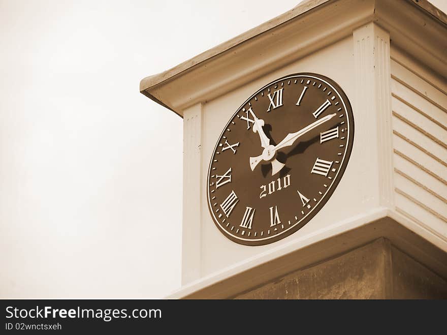 A clock face at the top of a castle tower. A clock face at the top of a castle tower