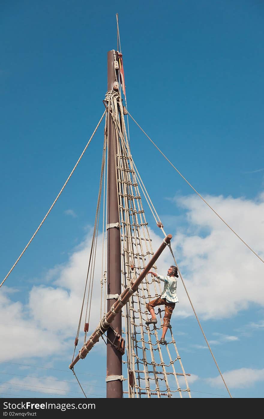 Mast of the replica of a Columbus's ship with a replica of person