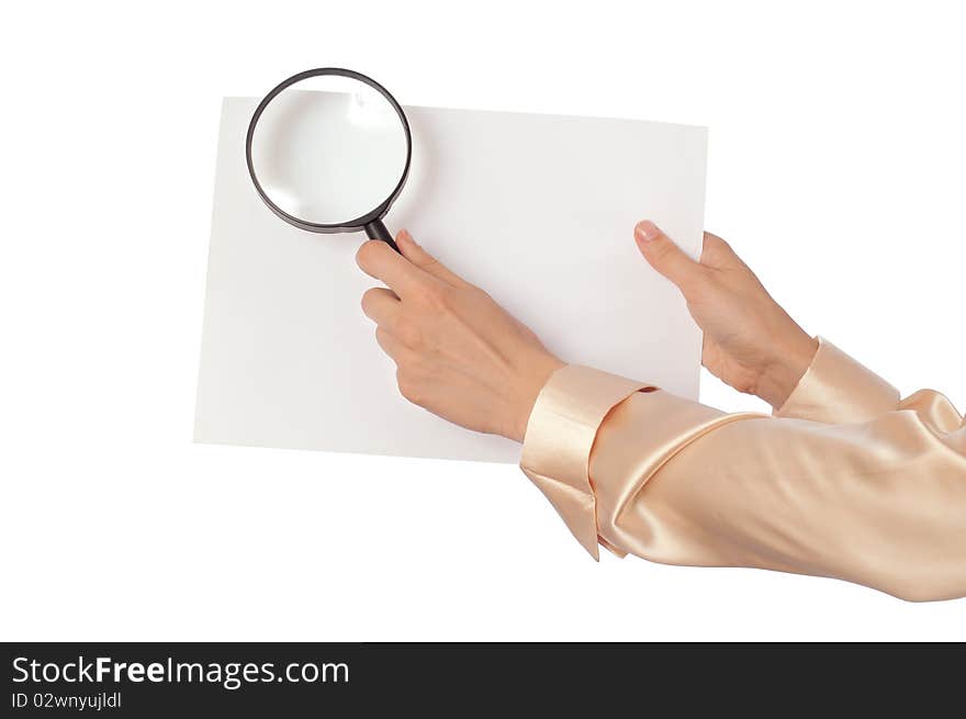 New worker looking at the white blank paperwith a magnifier