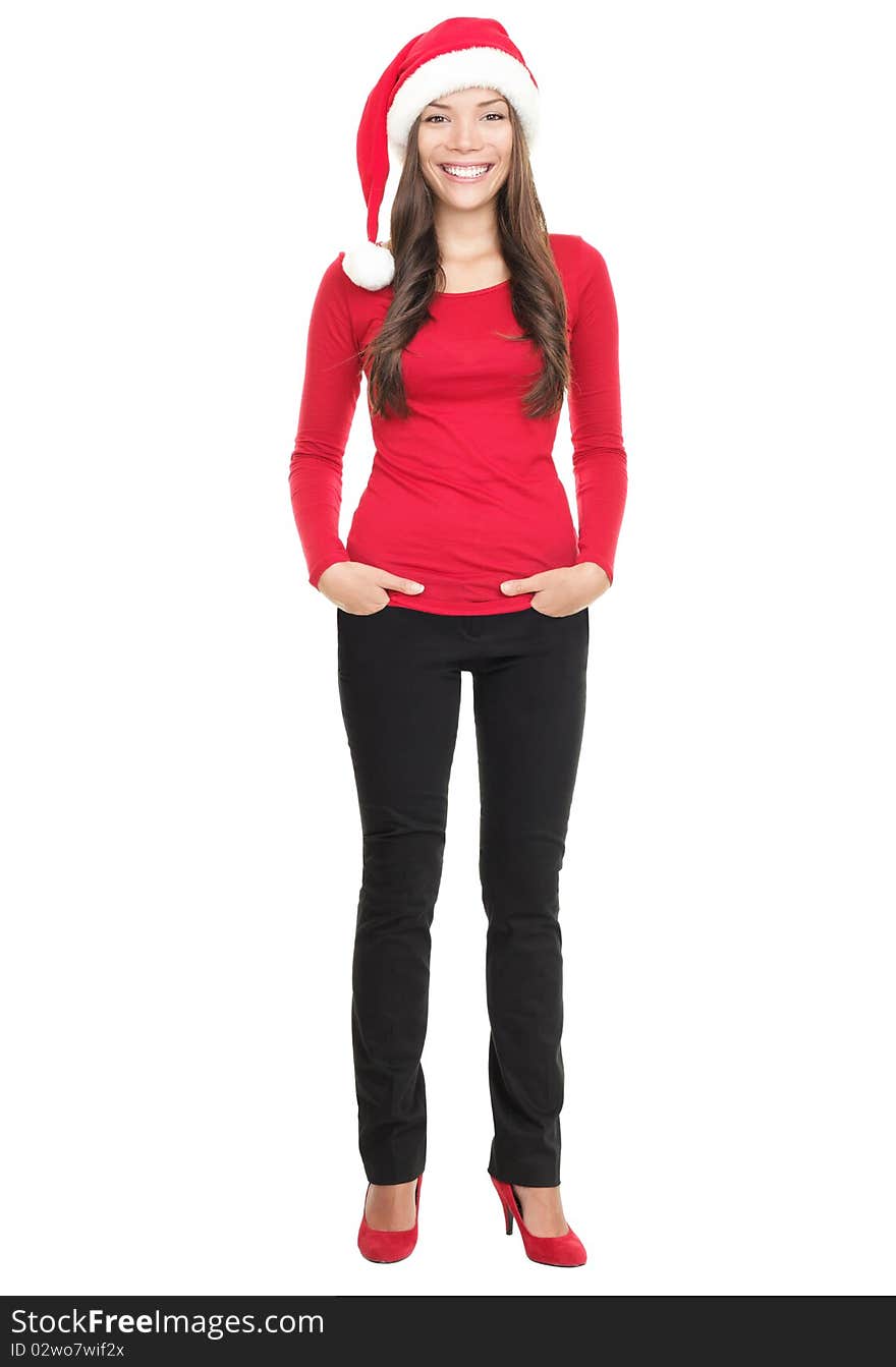 Casual christmas woman smiling standing with Santa hat isolated in full length. Asian Chinese / white Caucasian young woman on white background. Casual christmas woman smiling standing with Santa hat isolated in full length. Asian Chinese / white Caucasian young woman on white background.