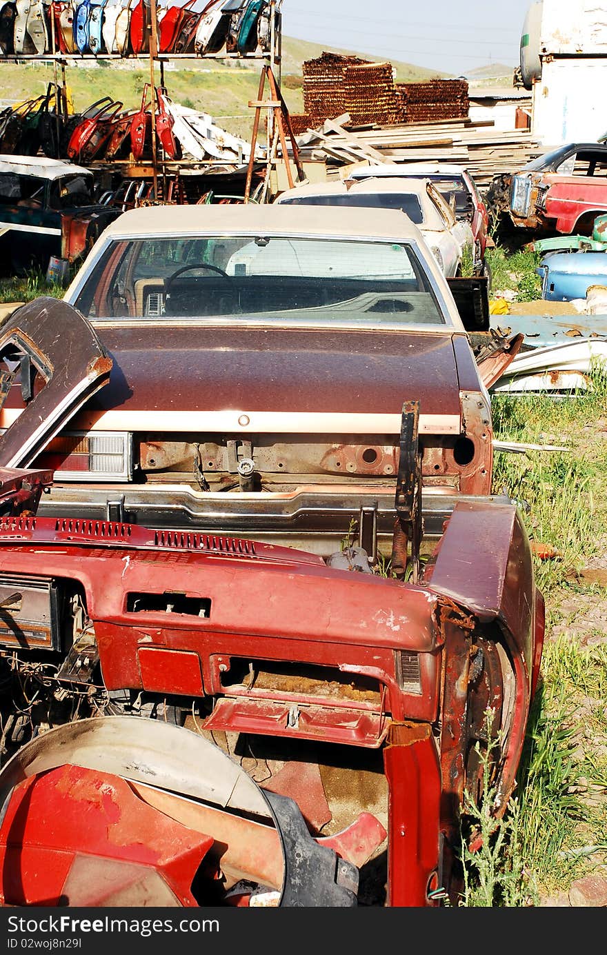 Vintage cars abandoned and rusting away in rural wyoming. Vintage cars abandoned and rusting away in rural wyoming