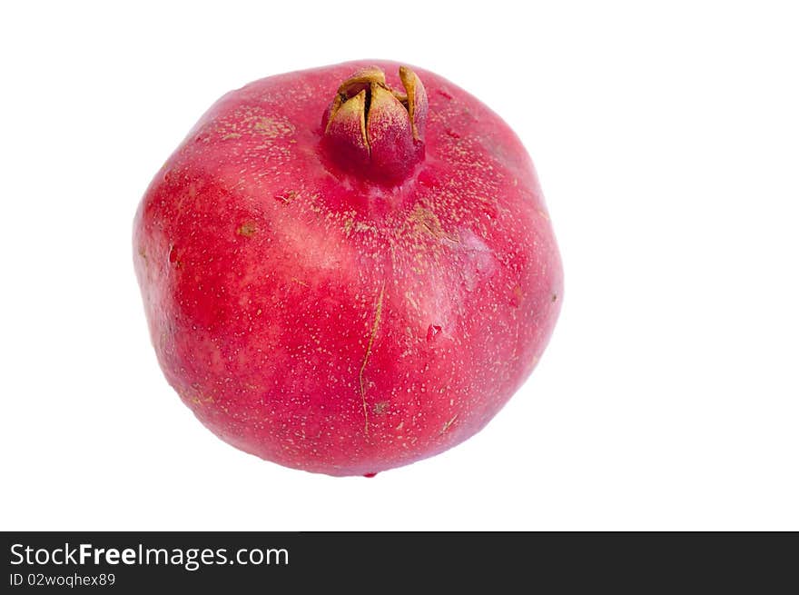 Red whole pomegranate isolated on white. Red whole pomegranate isolated on white