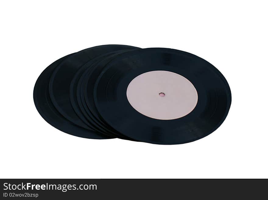 Old vinyl records on white background.