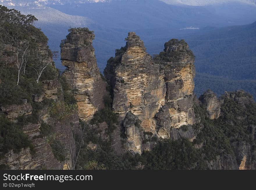 A view of the 3 sisters in the Blue Mountains Australia. The blue color is created by the eucalyptus oil in the trees