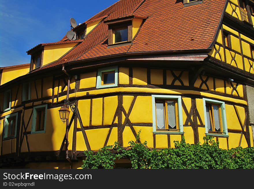 Yellow traditional house in alsace in france