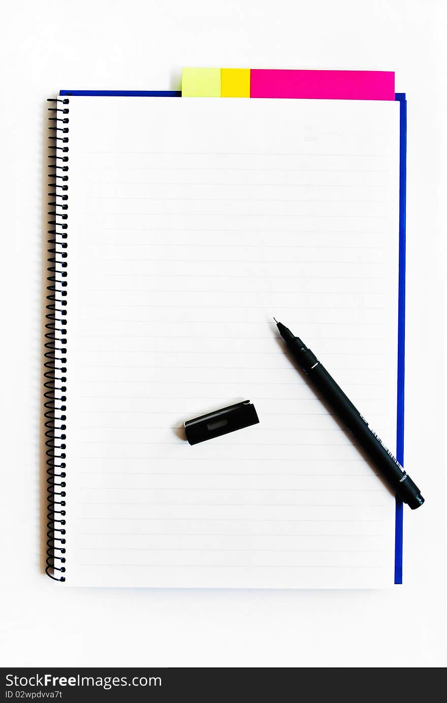 Blank Notebook With A Pen Isolated