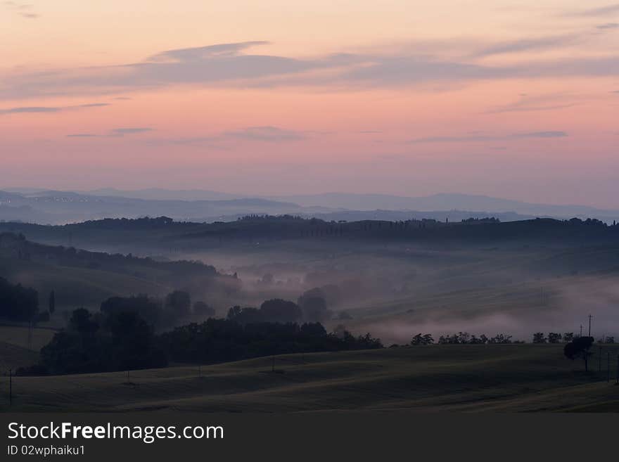 Sunset morning with fog in Tuscany. Sunset morning with fog in Tuscany