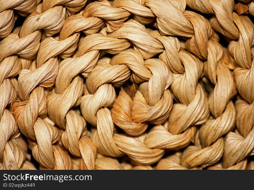 Straw basket detail, texture, brown wood.