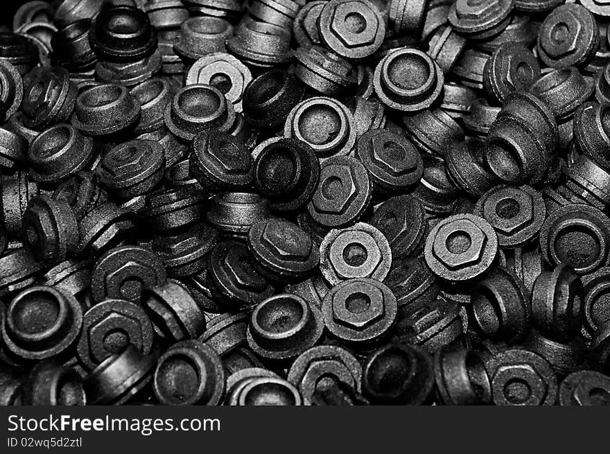 Closeup of steel nuts. Black and white