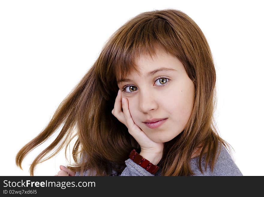 Portrait of a beautiful little girl on a white background